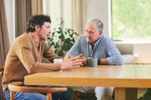 Image of parent talking to adult child